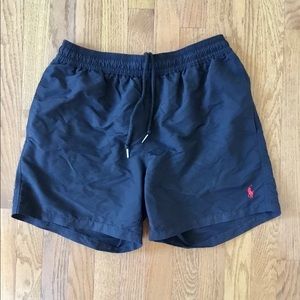 Ralph Lauren Polo swim trunks.  Black with red logo. Size medium. Inseam 5 3/4